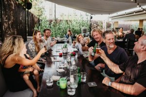 Family group toasting their drinks at Tapas Ibiza